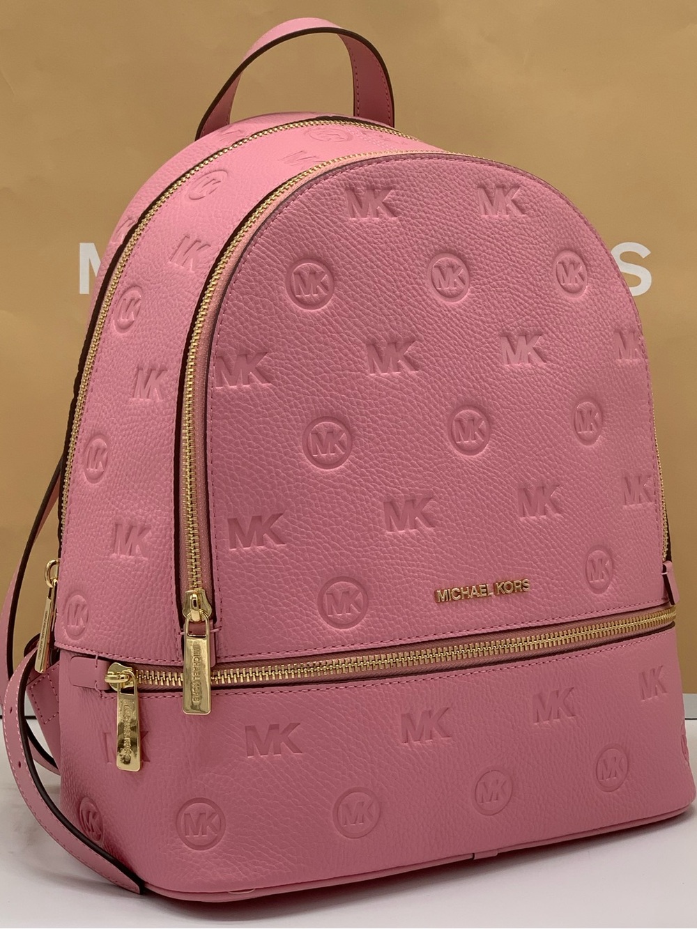 Michael Kors Rhea Carnation color Embossed MK Logo Backpack with Gold Hardware